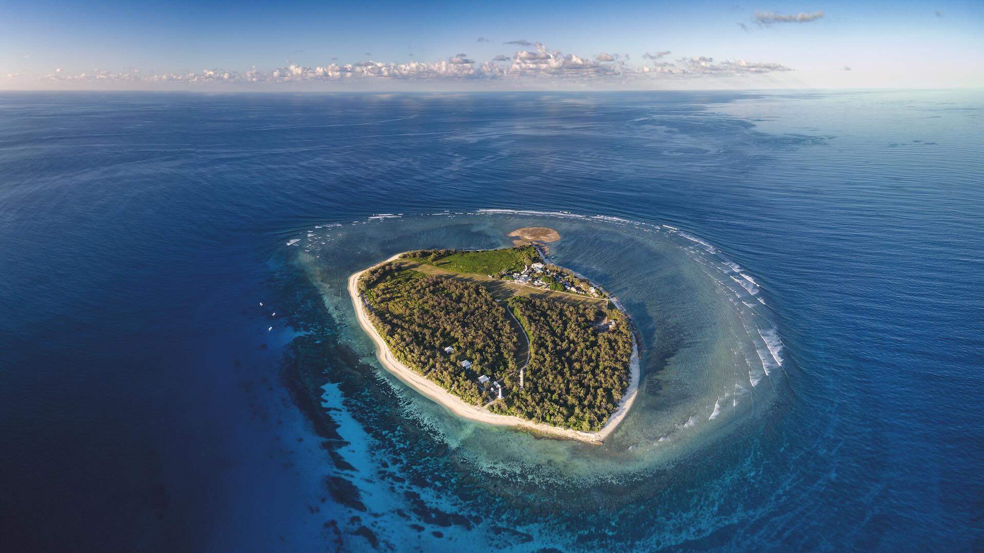 Lady Elliot Island and its coral reef viewed from the sky at sunset; Shutterstock ID 1119059426; purchase_order: -; job: -; client: -; other: -