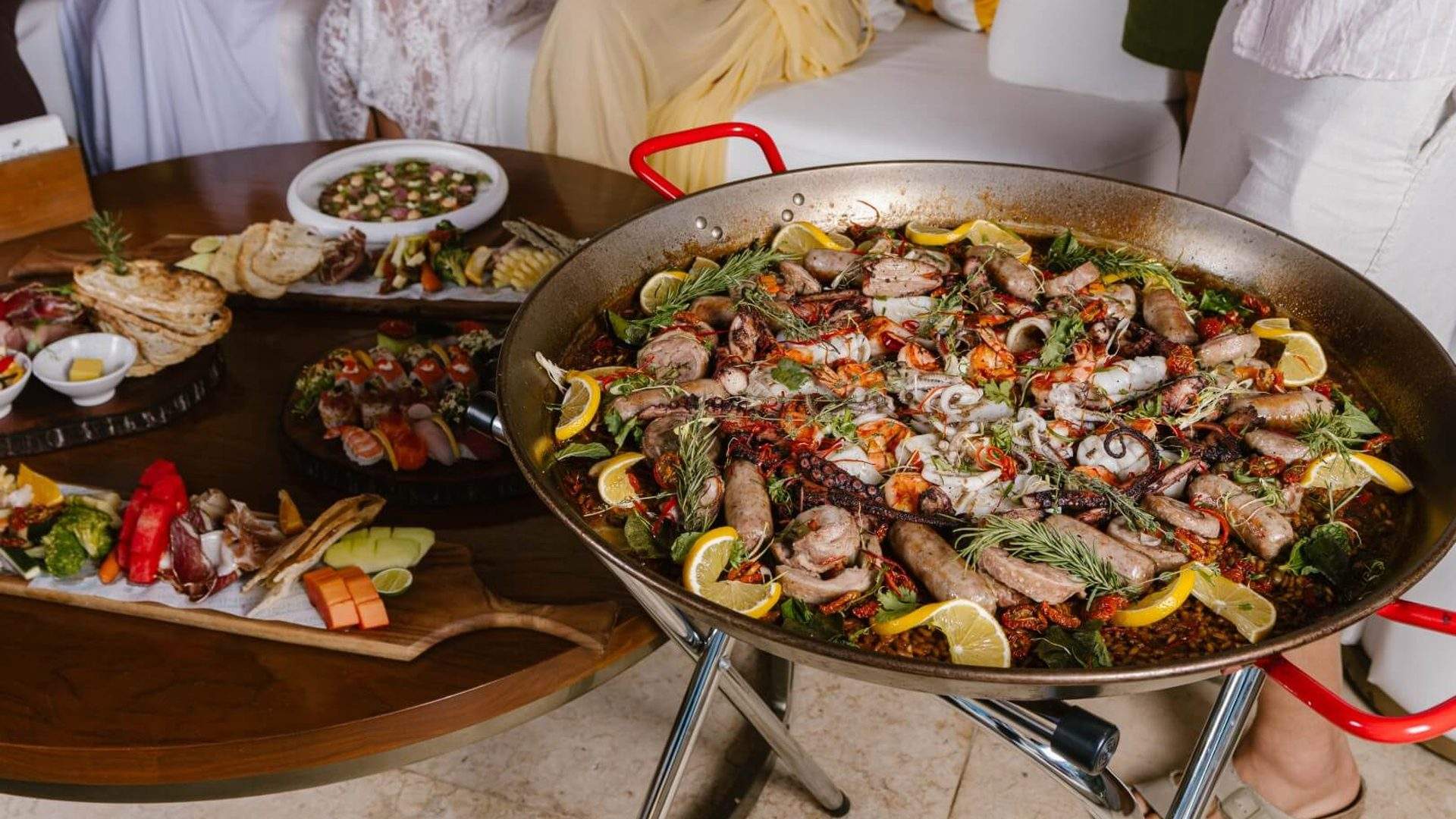 King prawn paella, sausage and sashimi on FINNS Beach Club's exclusive VIP menu in Canggu