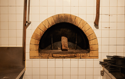 Background image for Open-Flame Restaurants That Cook With Fire and Smoke