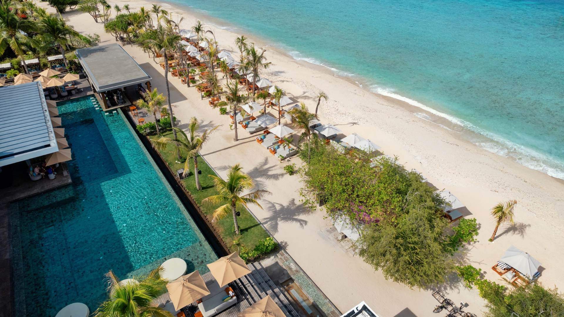 Drone shot of the villas and pools at BASK, Gili Meno