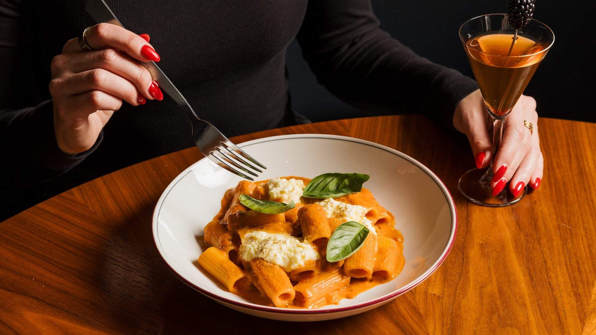 Spicy vodka rigatoni with stracciatella at Belasco